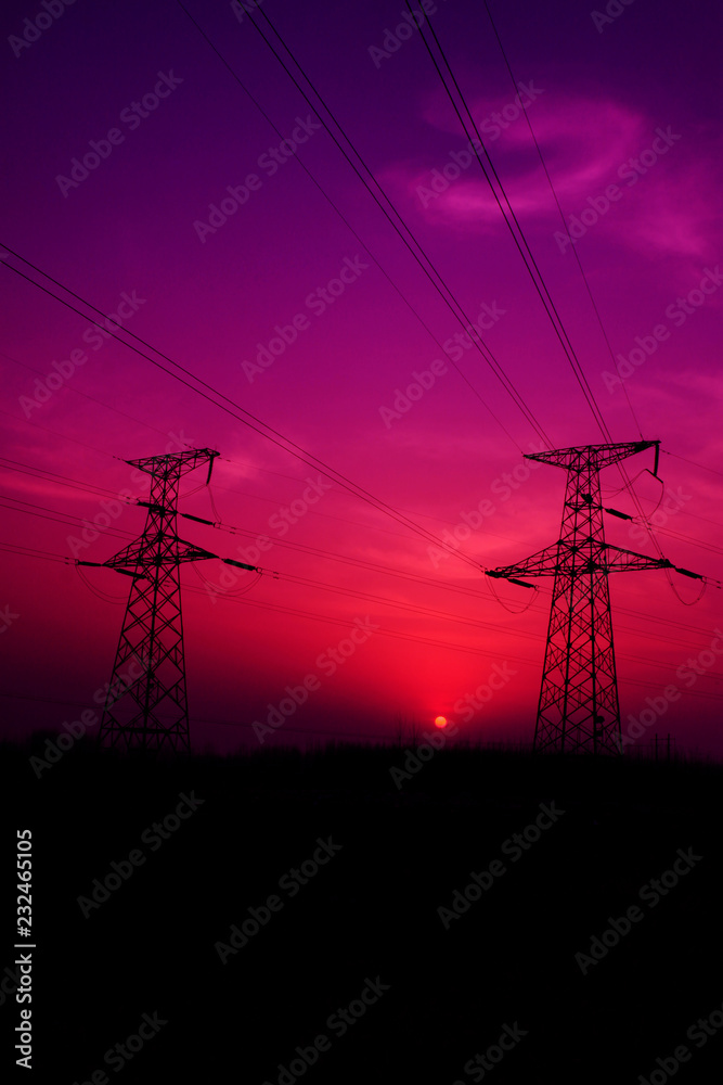 Fototapeta premium electric tower in the evening sky
