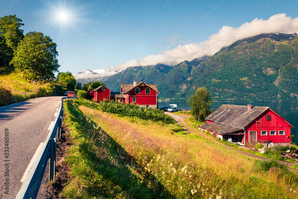 Sunny summer morning in Lofthus village in Ullensvang municipality which is located in the Hardanger region of Hordaland county, Norway. Beauty of countryside concept background.