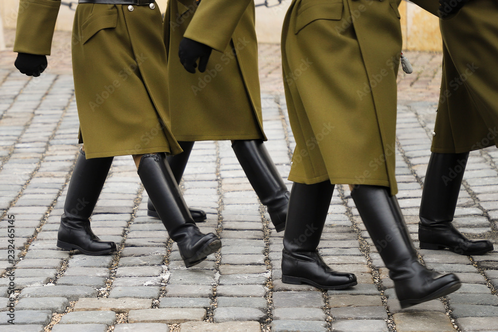 Soldiers marching on the street. Soldiers marching on the street.