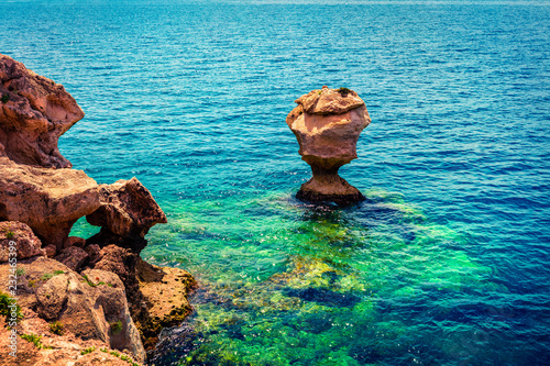 Sunny spring view of West Court of Heraion of Perachora, Limni Vouliagmenis location. Colorful morning seascape of Aegean sea, Greece, Europe. Traveling concept background. photo