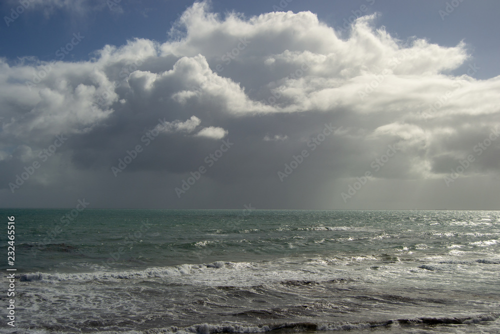 Landscape of the ocean with clouds