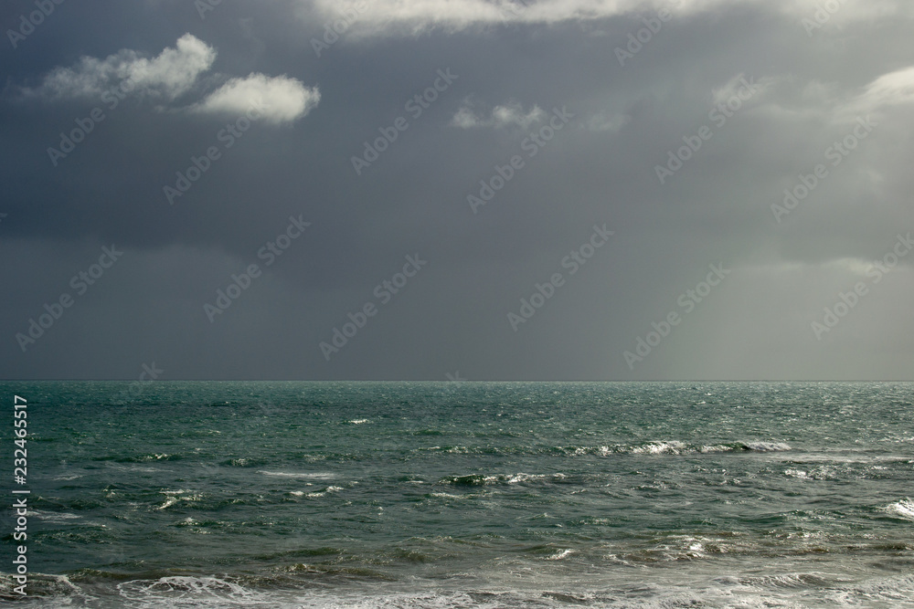 Landscape of the ocean with clouds