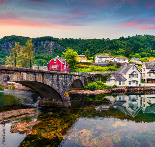 Fantastic summer sunrise in Norheimsund village, municipality of Kvam in Hordaland county. Colorful morning scene in Norway, Europe. Traveling concept background. photo