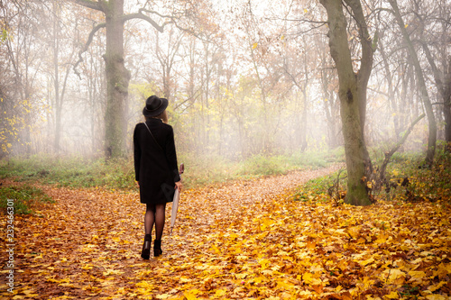 Girl in the park in the fog © Mallivan