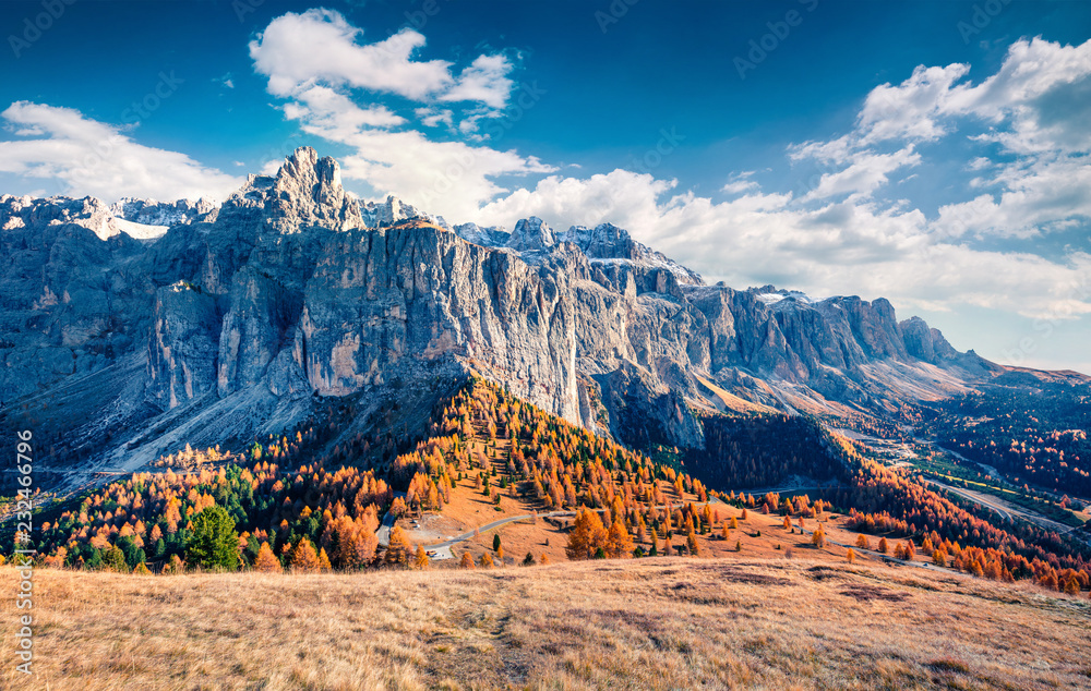 Impressive view from the top of Gardena pass with Piz Boe mountain on background. Colorful autumn scene of the Dolomite Alps, Canazei, Province of Trento, Italy, Europe.