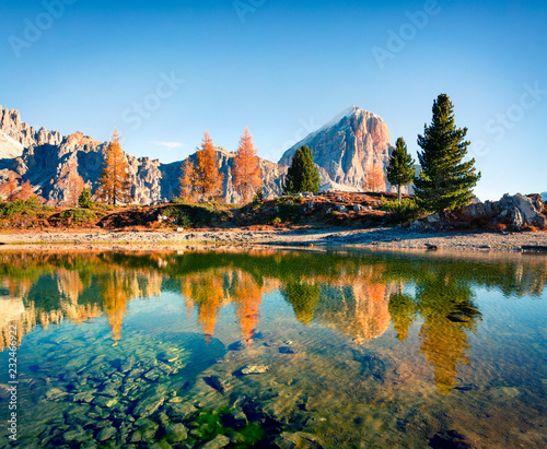 Splendid autumn view of Limides Lake and Lagazuoi mountain. Colorful morning view of Dolomite Alps, Falzarego pass, Cortina d'Ampezzo lacattion, Italy, Europe. Beauty of nature concept background. photo
