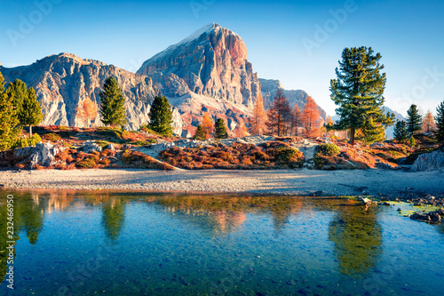 Splendid autumn view of Limides Lake and Lagazuoi mountain. Colorful morning view of Dolomite Alps, Falzarego pass, Cortina d'Ampezzo lacattion, Italy, Europe. Beauty of nature concept background.