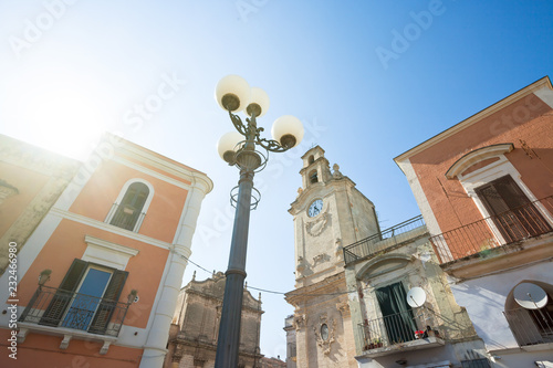 Принти на полотні Massafra, Apulia - The sun illuminating the historic church of Massafra