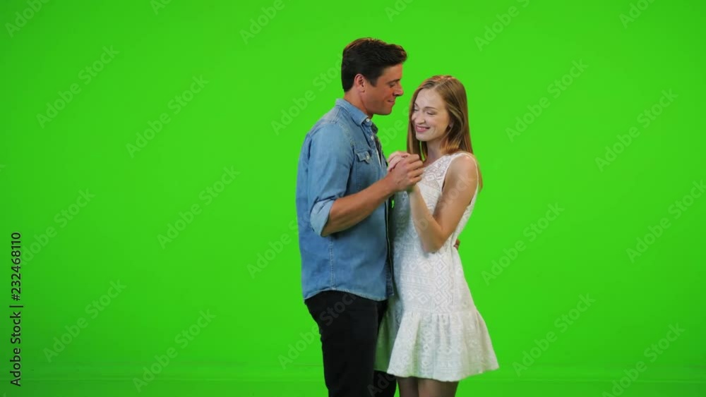 A in love man and a woman slow dancing, relaxed. Over a green screen. A in love man and a woman slow dancing, relaxed. Over a green screen.