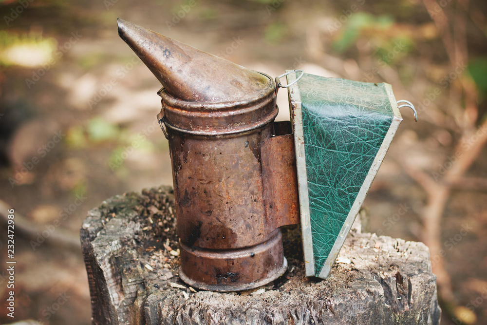 Smoker is used to calm bees. Smoker is used to calm bees.