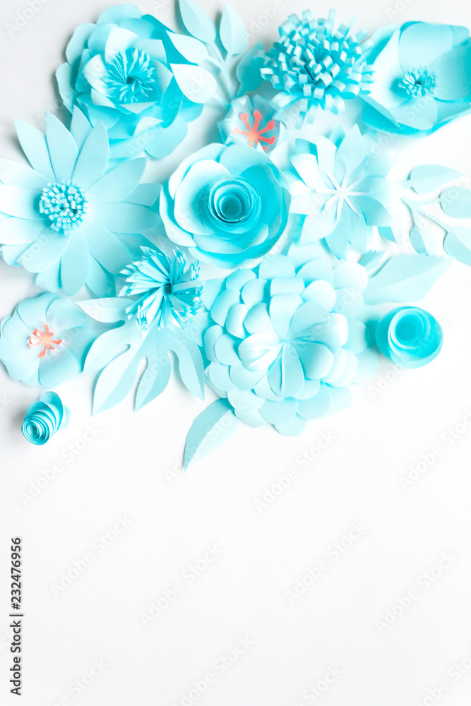 blue paper flowers on the white background
