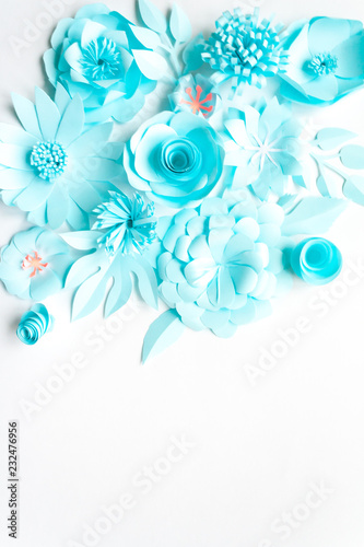 blue paper flowers on the white background