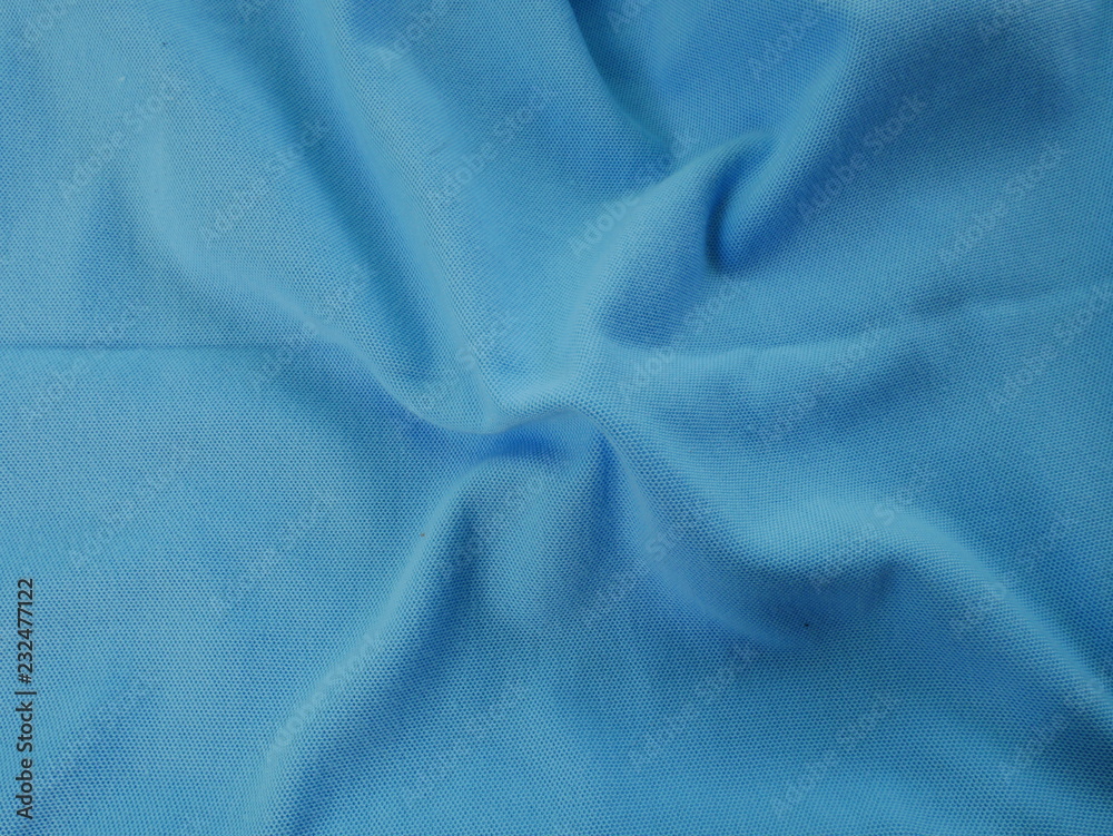 Fototapeta premium blue sportswear cloth background,texture of silk fabric,blue cotton