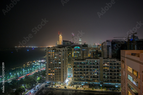 High shot of Abu Dhabi city towers and skyline at night - Corniche view