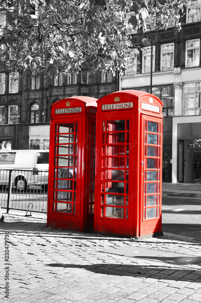 black and white photo with red telephone booth at London city United Kingdom black and white photo with red telephone booth at London city United Kingdom