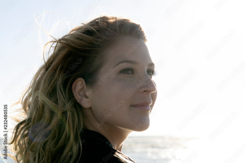 Portrait of a beautiful woman in summer at the sea Portrait of a beautiful woman in summer at the sea