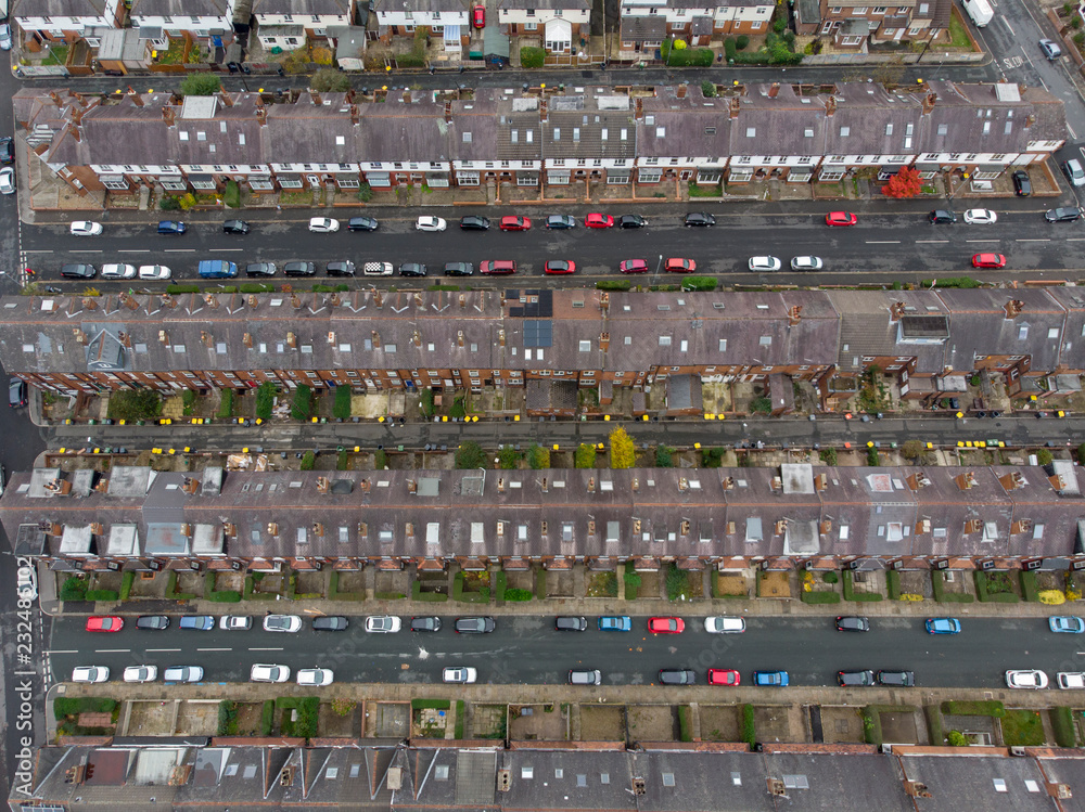 Aerial photo of a typical town in the UK showing rows of houses, paths & roads, taken over Headingley in Leeds, which is in West Yorkshire in the UK.