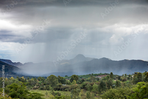 Canvas Print Localized rain storm pouring rain over the Ethiopian landscape.