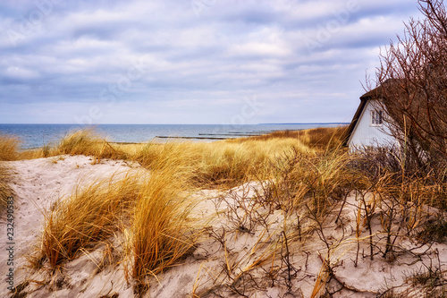 Fototapeta Naklejka Na Ścianę i Meble -  Panorama of the sand dune with house and view of the Baltic Sea.