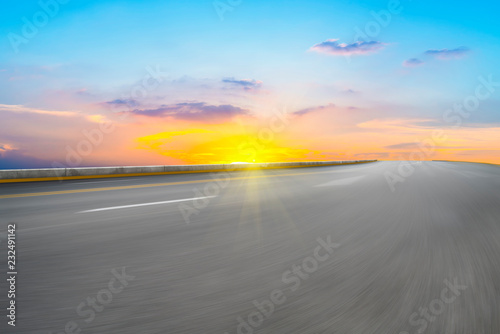 Empty highway asphalt pavement and sky cloud landscape..