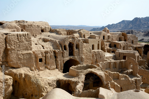 Ruins of anabandoned medieval village, Kharanaq, Iran photo