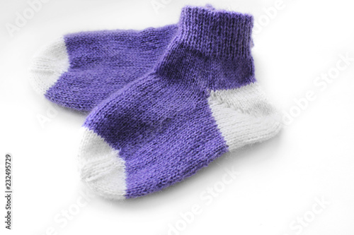 Knitted socks on a white background