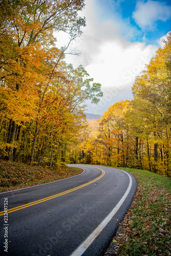 Scenic autumn drive through colorful foliage