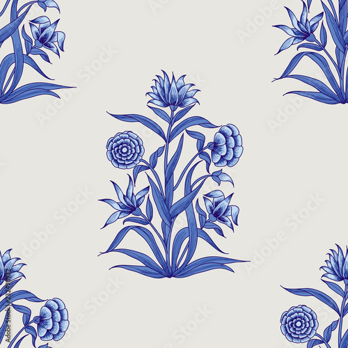 Woodblock printed indigo dye seamless ethnic floral all over pattern. Traditional oriental motif of India Mogul with bouquets of carnations, blue hues on ecru background. Textile design. photo