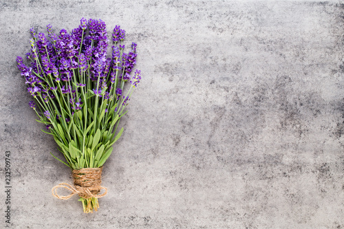 Fototapeta Naklejka Na Ścianę i Meble -  Lavender flowers, bouquet on rustic background, overhead.