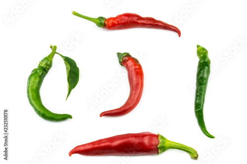 Five hot peppers isolated on a white background.