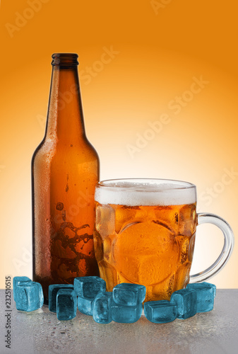 a bottle of beer with a mug