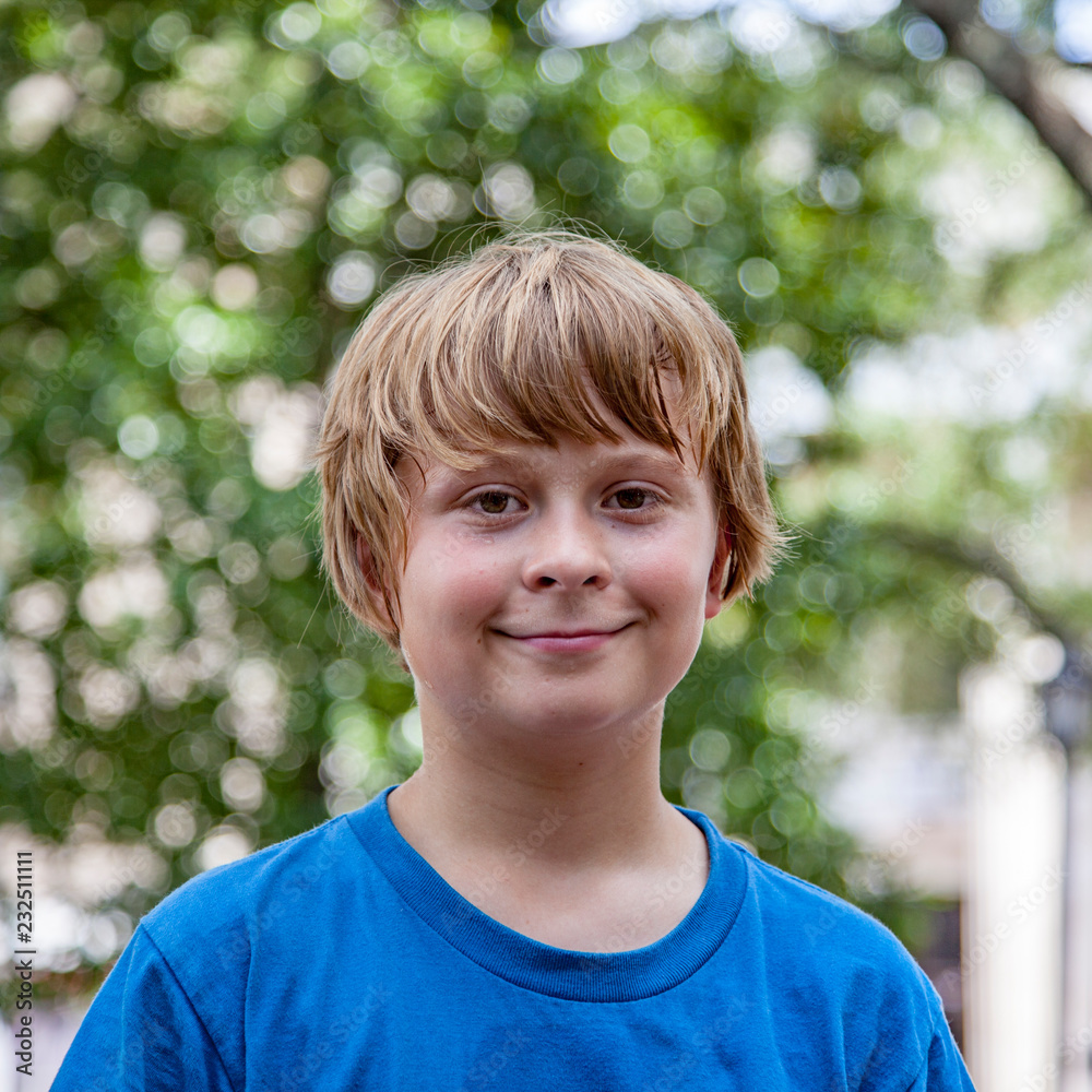outdoor portrait of cute smiling young boy outdoor portrait of cute smiling young boy