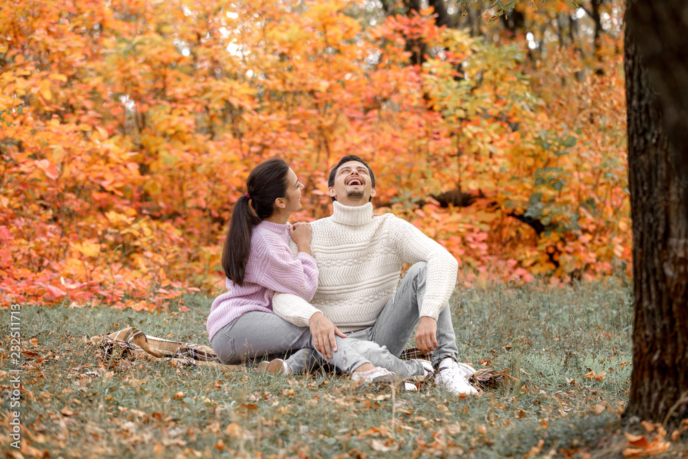 Couple in love in the autumn leaves Couple in love in the autumn leaves