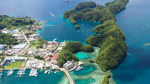 Aerial panoramic view of city of Koror, azure crystal clear water of western Pacific Ocean - landscape panorama of Micronesia from above, Koror Island, Palau