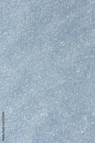 Snow surface with crystalline snowflake