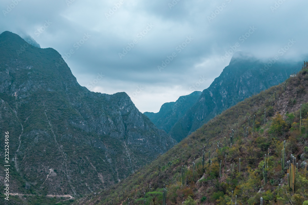 Panoramic view of mountains on blue sky Panoramic view of mountains on blue sky