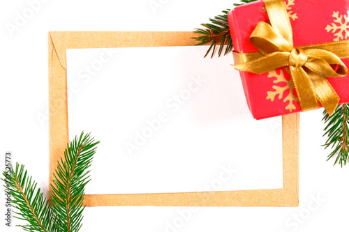 Festive flat lay composition with blank invitation for new year celebration and craft paper envelope. Christmas greeting card template concept. Background, copy space, top view.
