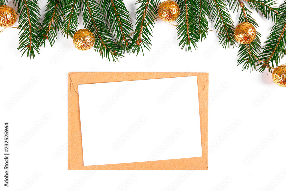 Festive flat lay composition with blank invitation for new year celebration and craft paper envelope. Christmas greeting card template concept. Background, copy space, top view. Festive flat lay composition with blank invitation for new year celebration and craft paper envelope. Christmas greeting card template concept. Background, copy space, top view.