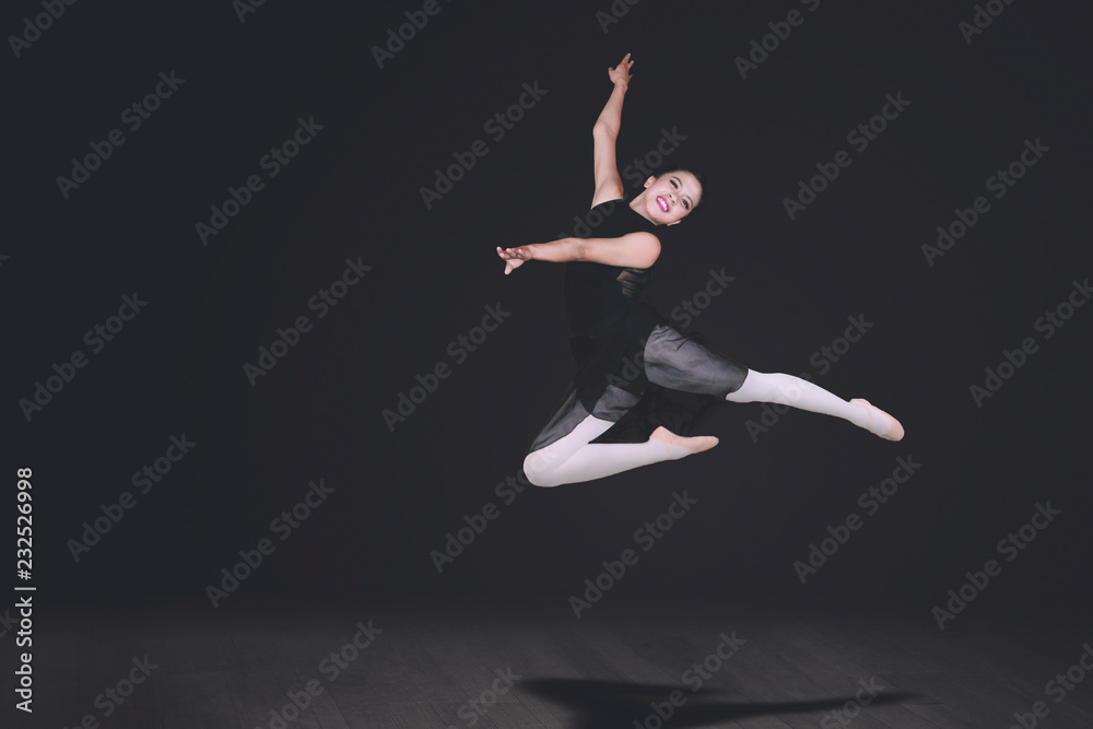 Beautiful ballerina performs dances