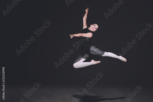 Beautiful ballerina performs dances