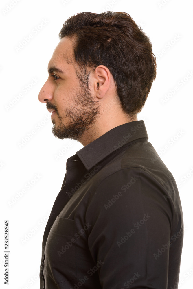 Profile view of young handsome Indian man Profile view of young handsome Indian man