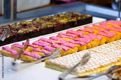 A variety of cakes on the display of a pastry shop