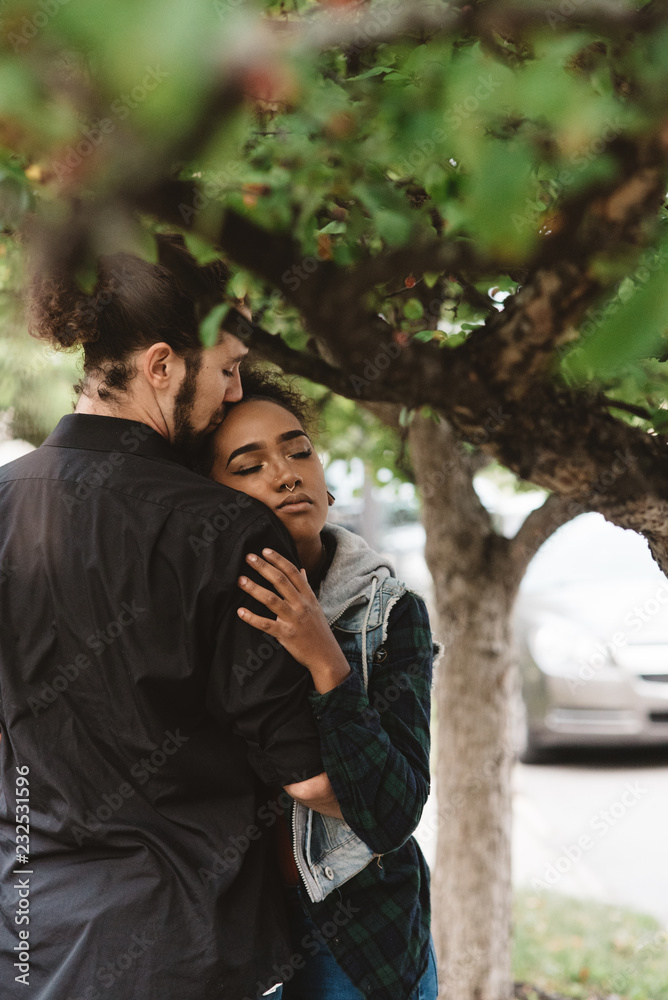 Portraits of a diverse young couple in the fall Portraits of a diverse young couple in the fall