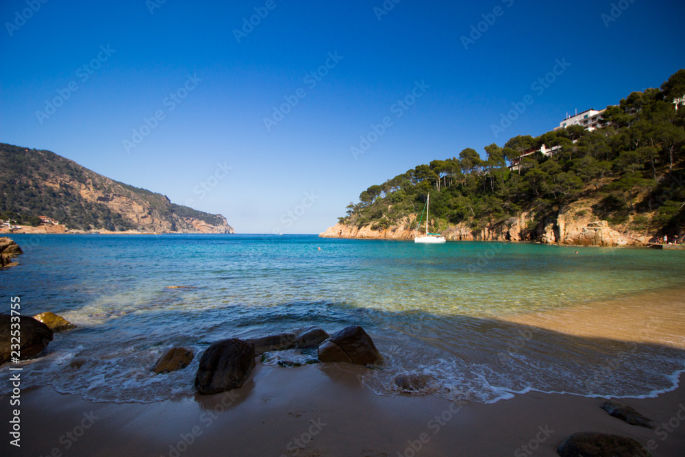 beach with rocks and sky