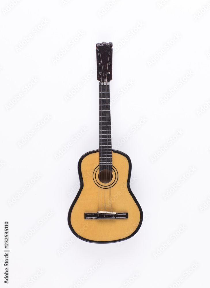 Fototapeta premium glossy guitar on a white background