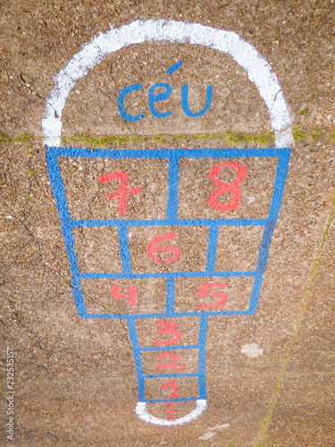 Colorful hopscotch game drawn on the floor - popular kids game. Ceu means Heaven photo