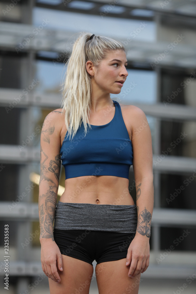 Serious sportive woman looking at camera Serious sportive woman looking at camera