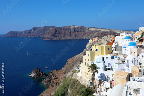 Santorini: Oia traditional greek white village with blue domes of churches, Greece