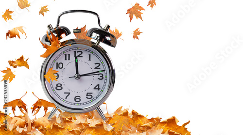 autumn time clock and leaves isolated for background