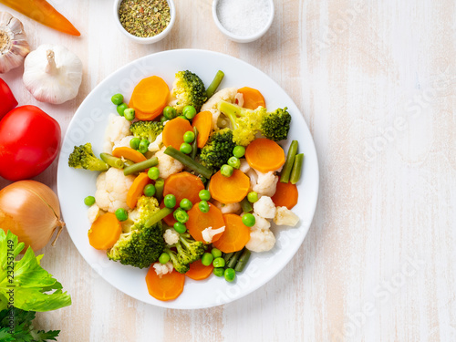 Schilderij op canvas Mix of boiled vegetables, steam vegetables for dietary low-calorie diet
